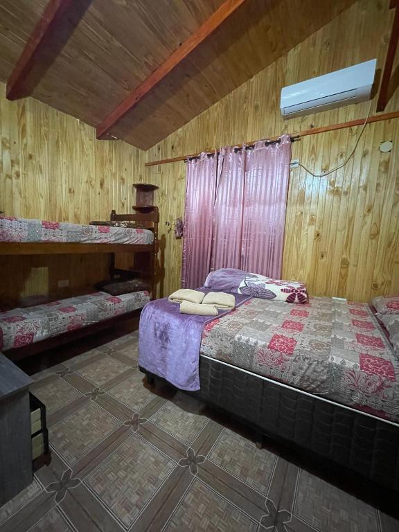 Postel nebo postele na pokoji v ubytování Cabañas Josesito