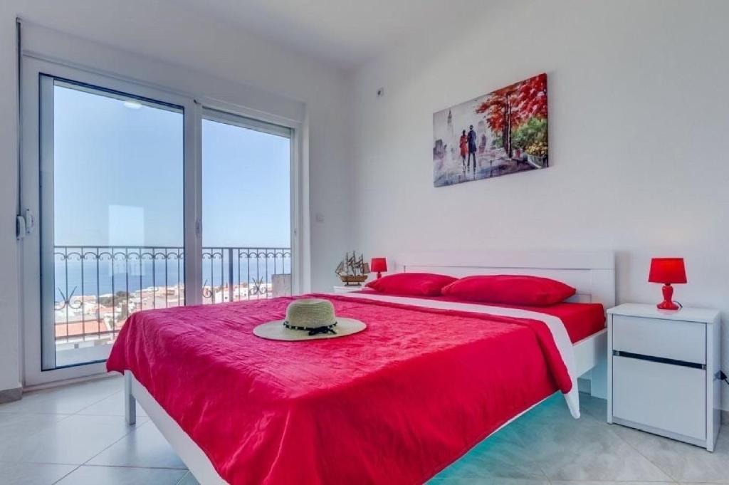 Postel nebo postele na pokoji v ubytování MarBok Apartments with SeaView