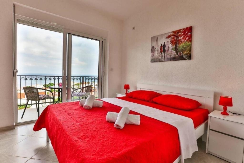 Postel nebo postele na pokoji v ubytování MarBok Apartments with SeaView