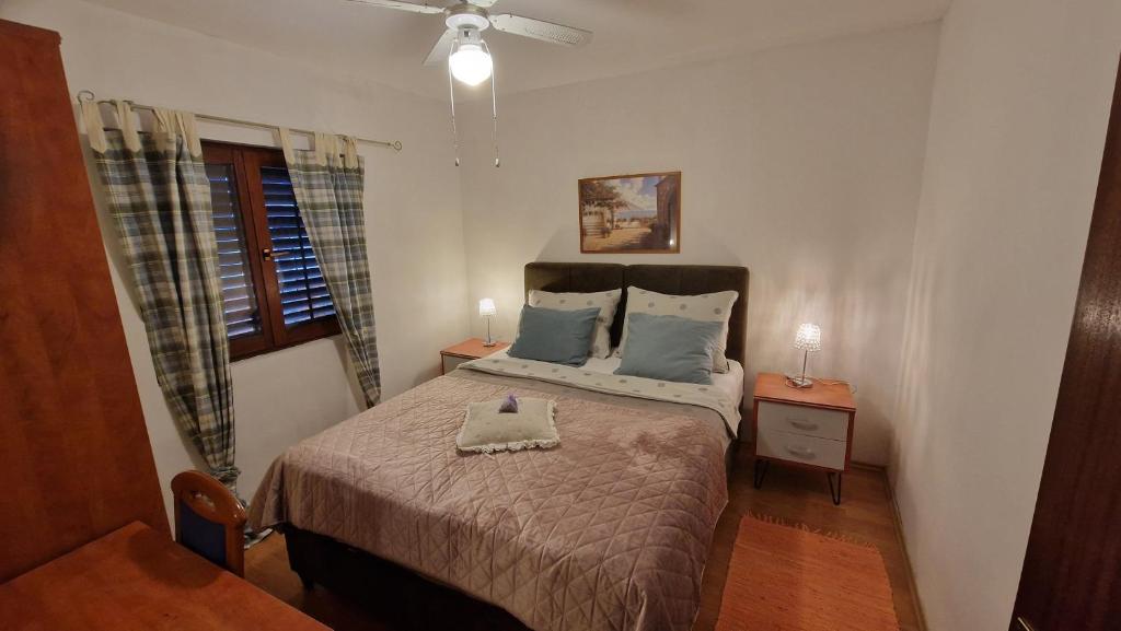 Postel nebo postele na pokoji v ubytování Villa Ivan