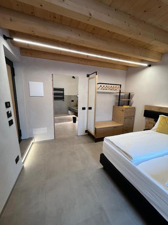 Postel nebo postele na pokoji v ubytování Stella D'Oro - Hotel & Apartments