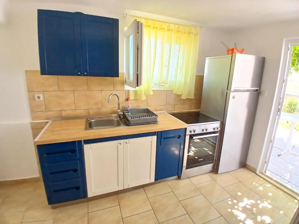 Kuchnia lub aneks kuchenny w obiekcie Apartments Neo