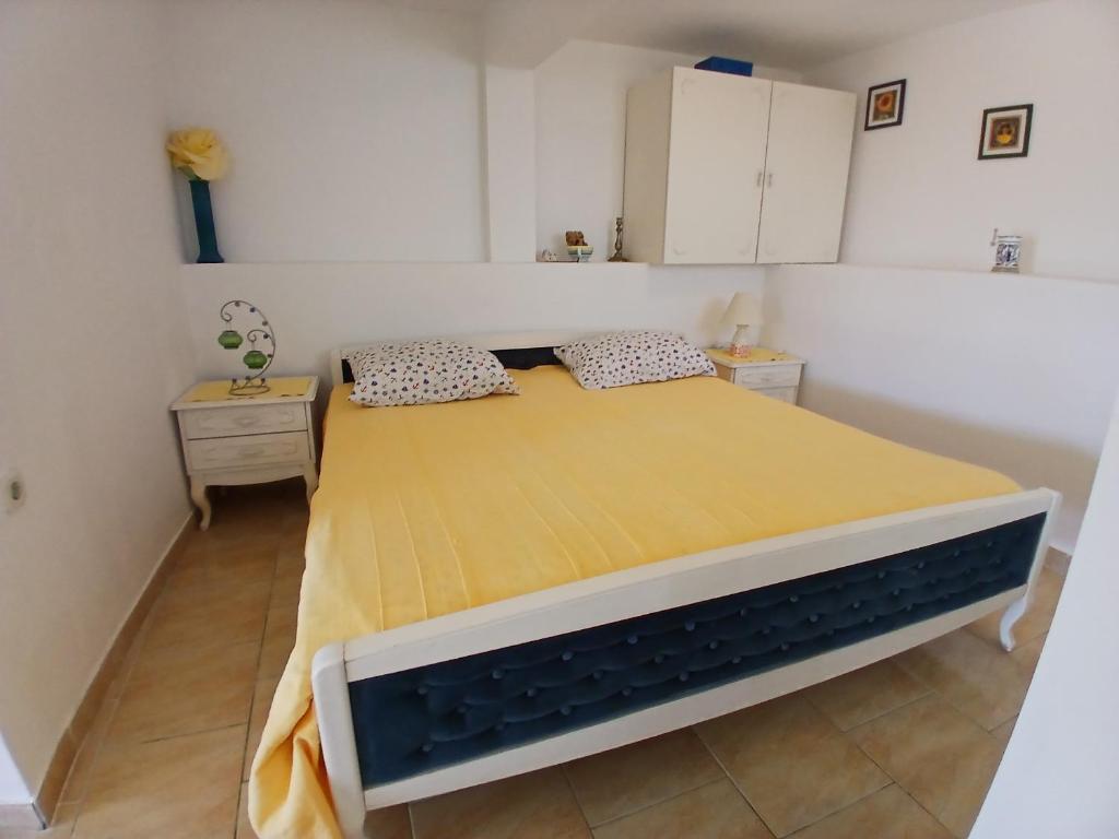 Łóżko lub łóżka w pokoju w obiekcie Apartments Neo