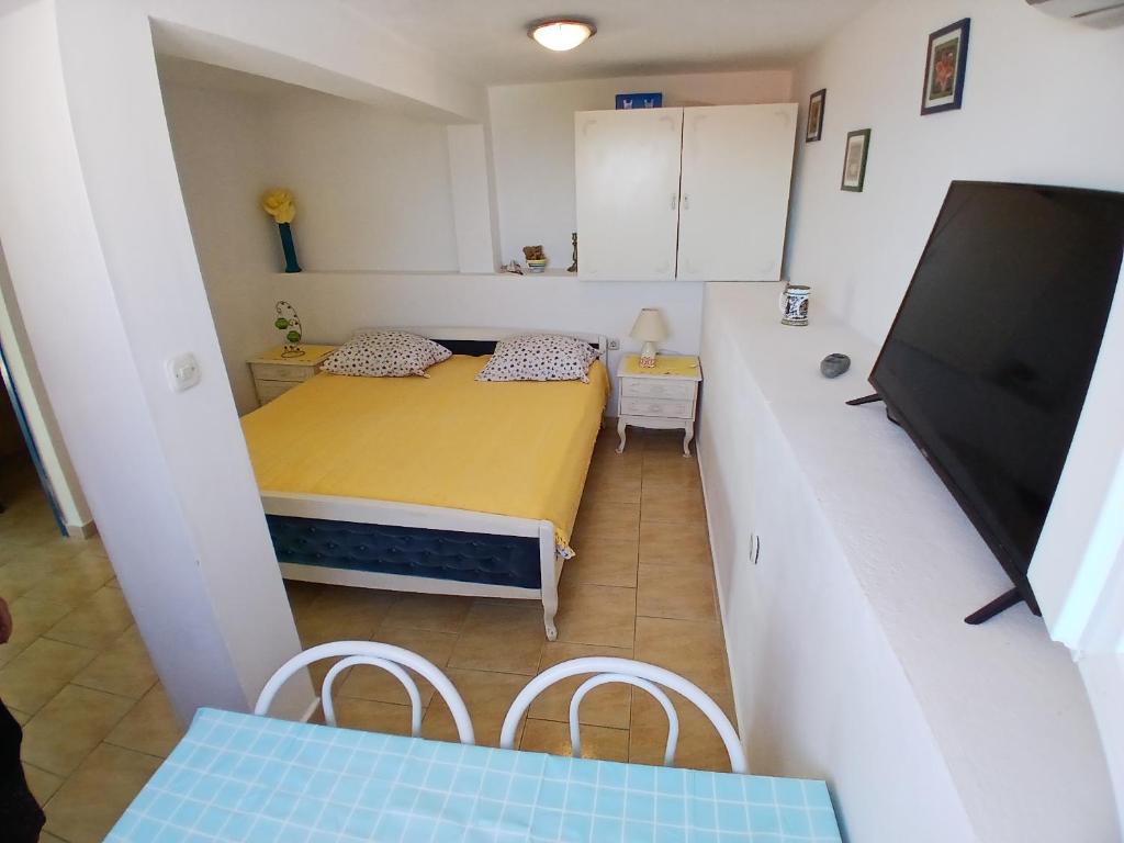 Łóżko lub łóżka w pokoju w obiekcie Apartments Neo