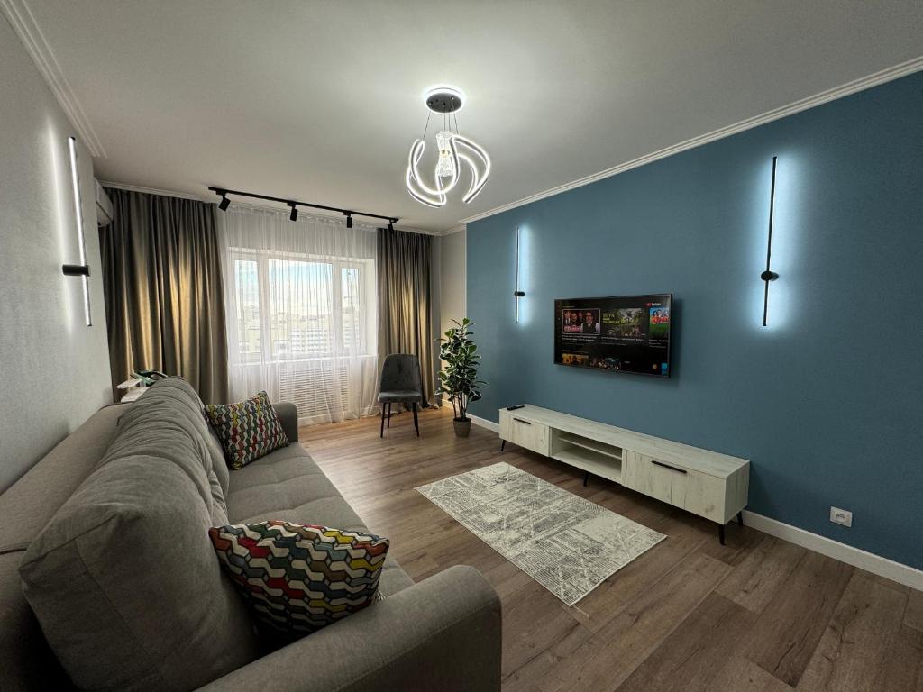 TV a/nebo společenská místnost v ubytování West Side