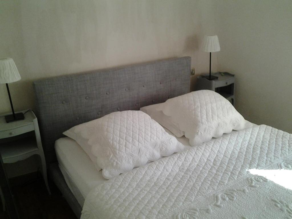 A bed or beds in a room at Mas De Hameau