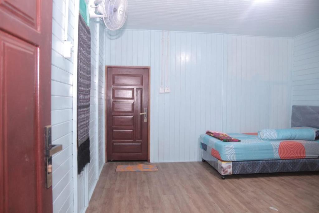 Postel nebo postele na pokoji v ubytování Worho Rhena Cottage