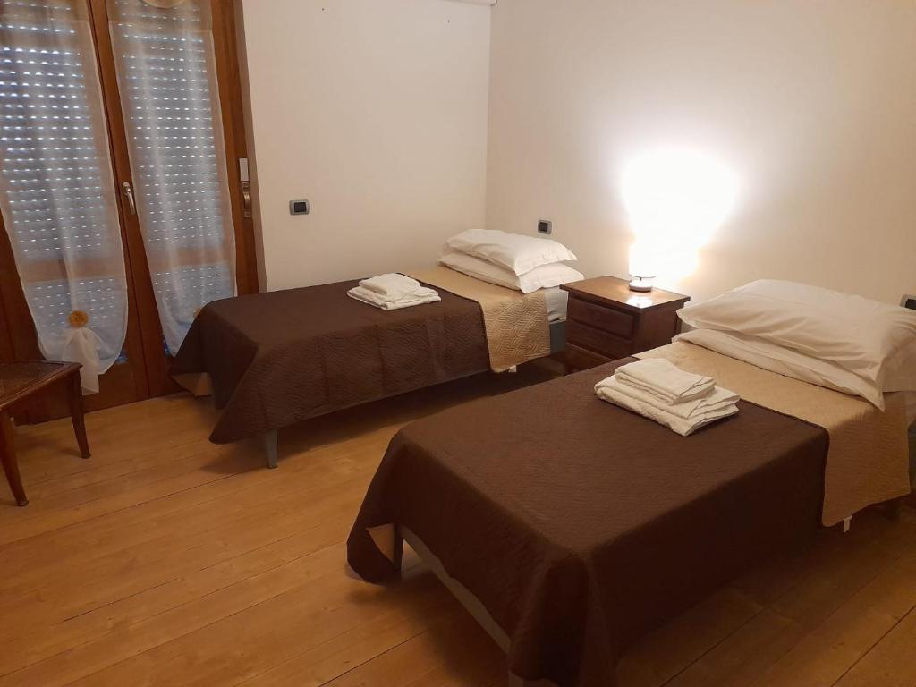Postel nebo postele na pokoji v ubytování Casa Palombara - Baschi
