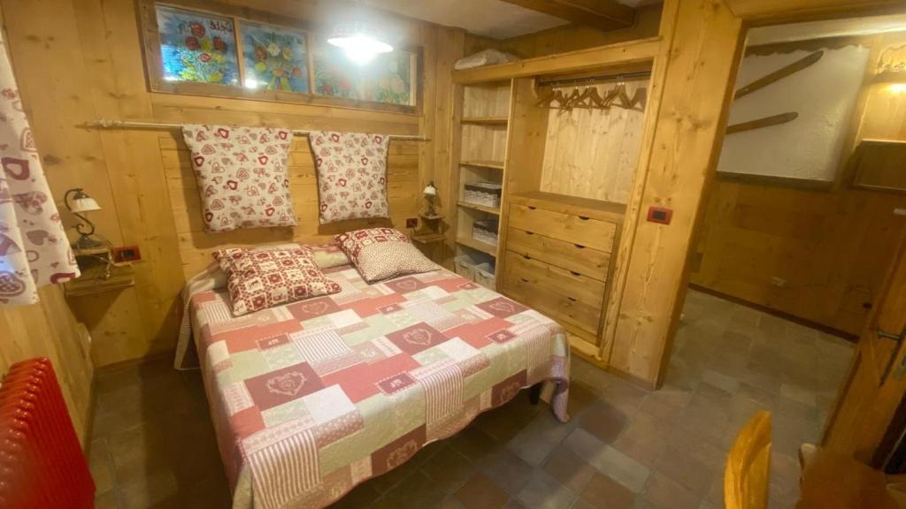 Postel nebo postele na pokoji v ubytování La Tana