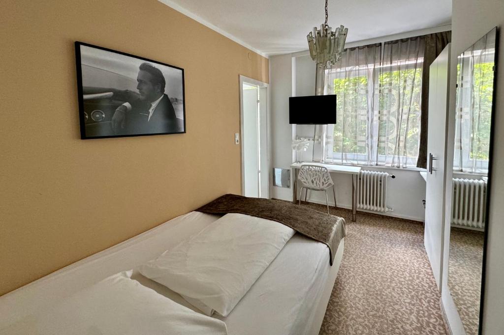 Uma cama ou camas num quarto em Boutique Hotel Oase