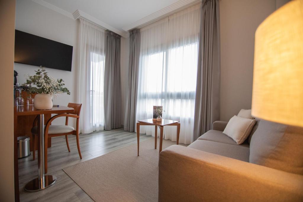 Телевизор и/или развлекательный центр в Hotel Spa Galatea
