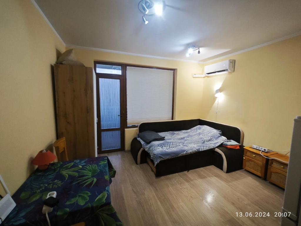 Ένα ή περισσότερα κρεβάτια σε δωμάτιο στο Apartment in the Center 2