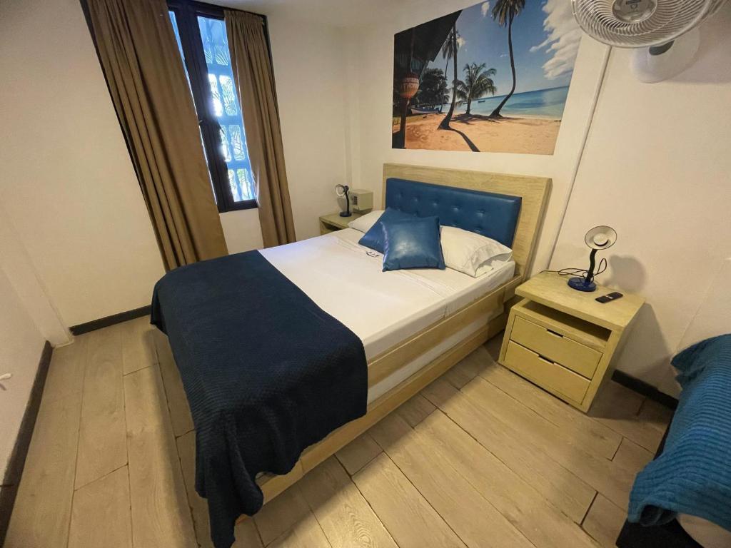 Postel nebo postele na pokoji v ubytování Air Guest House