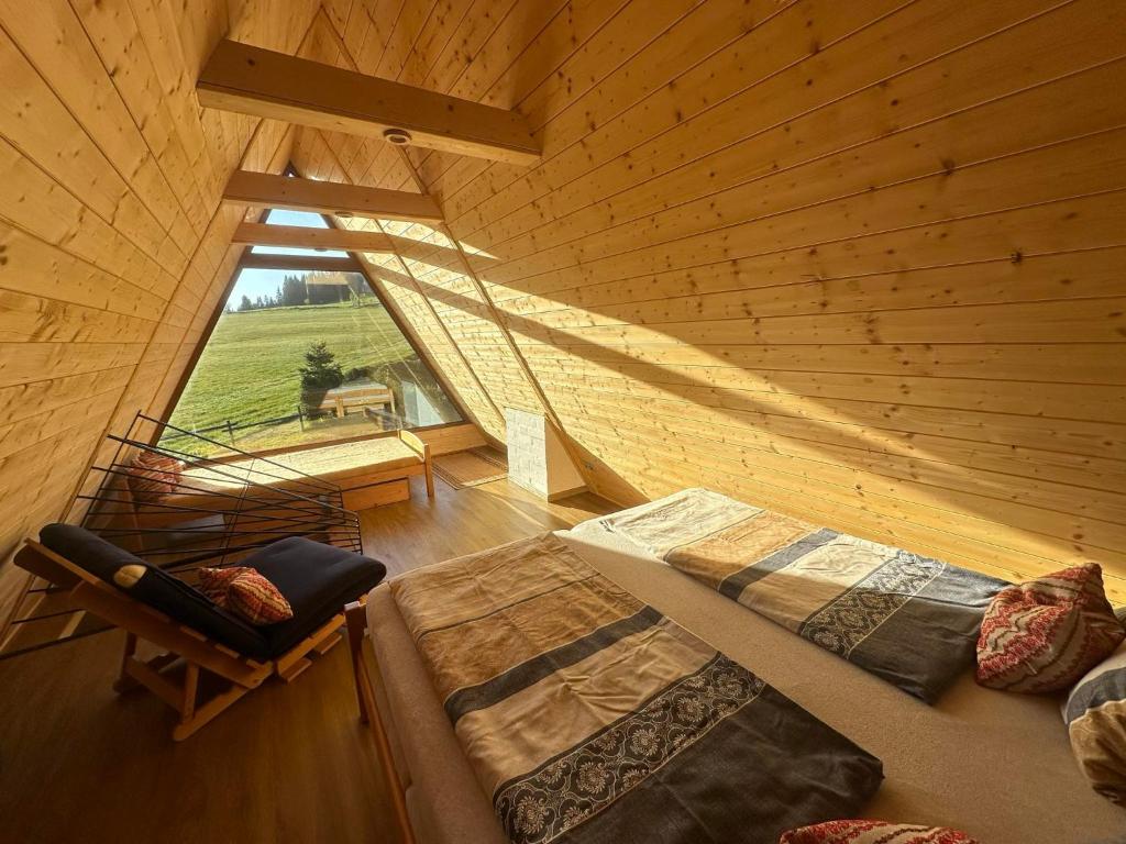 Postel nebo postele na pokoji v ubytování Chalet Galla