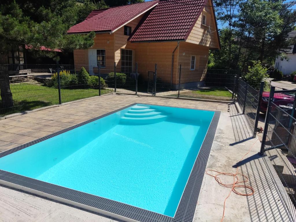 The swimming pool at or close to Chalupa Leštiny