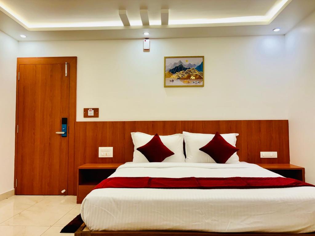 Ένα ή περισσότερα κρεβάτια σε δωμάτιο στο Hotel Starfinch Inn