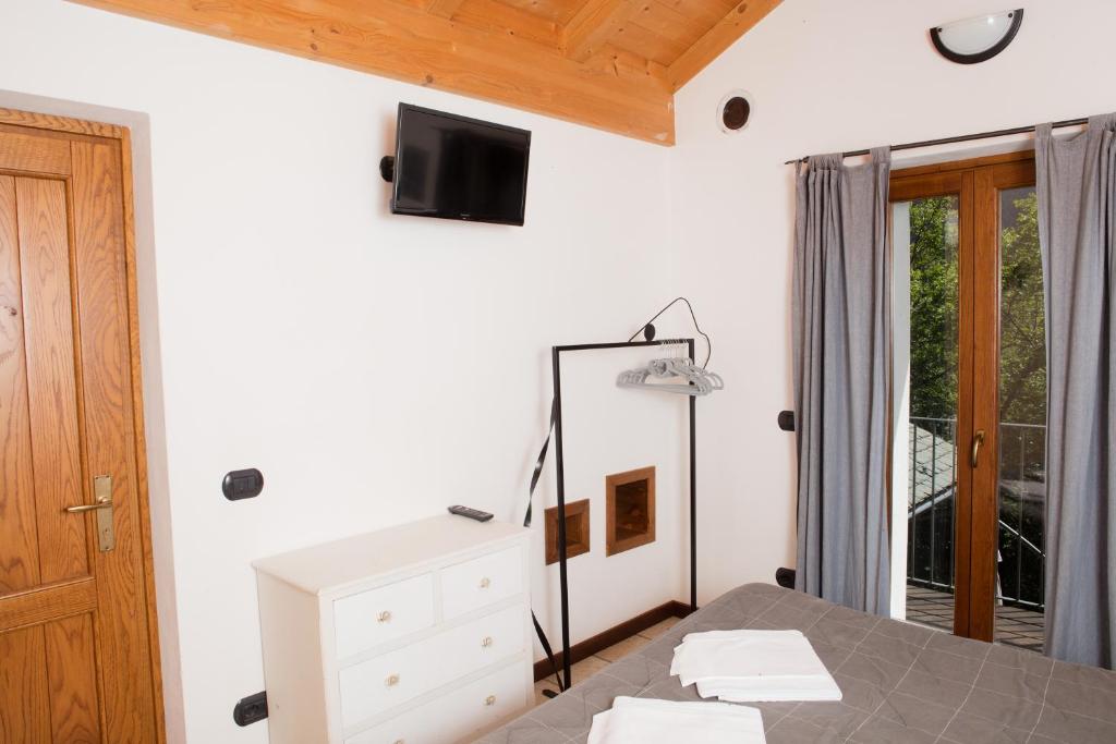 Telewizja i/lub zestaw kina domowego w obiekcie Agriturismo La Fonte Di Mariella