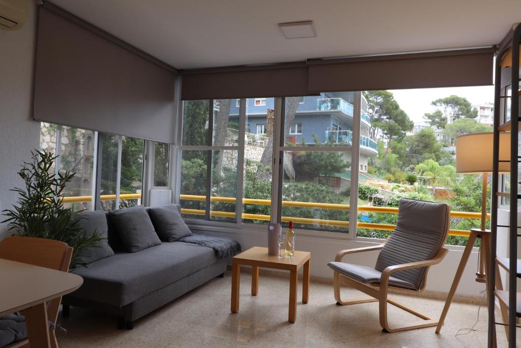 Posezení v ubytování Salouhouses Apartment Cala Crancs