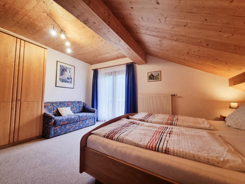 Postel nebo postele na pokoji v ubytování Guesthouse Schoba Typ D