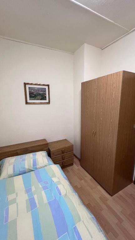 Postel nebo postele na pokoji v ubytování Grott Di Baloi