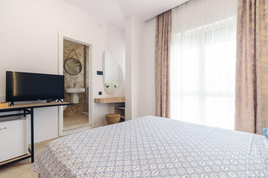 TV a/nebo společenská místnost v ubytování Apartments Mar