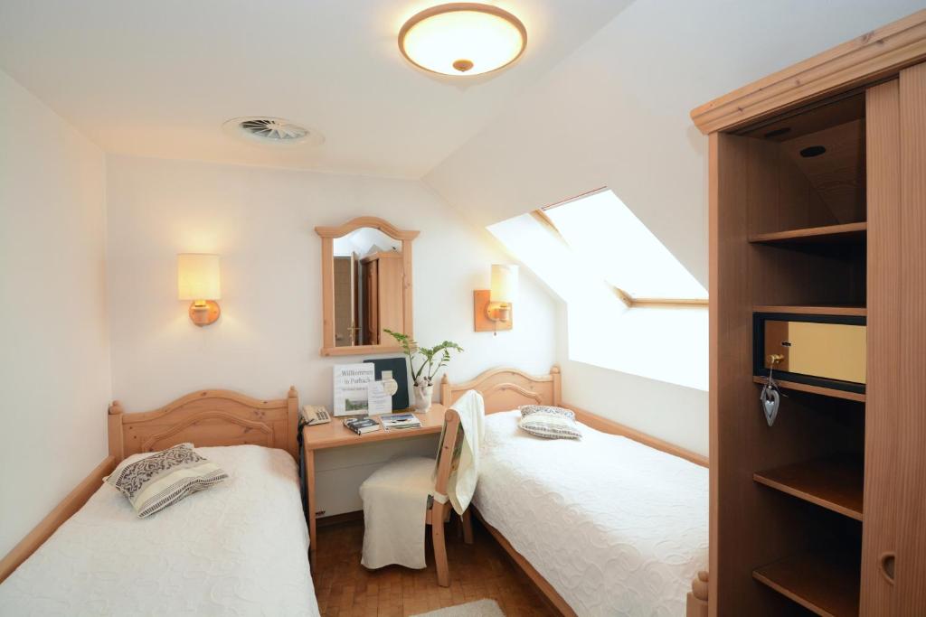 Postel nebo postele na pokoji v ubytování Hotel & Restaurant Braunstein - Pauli´s Stuben