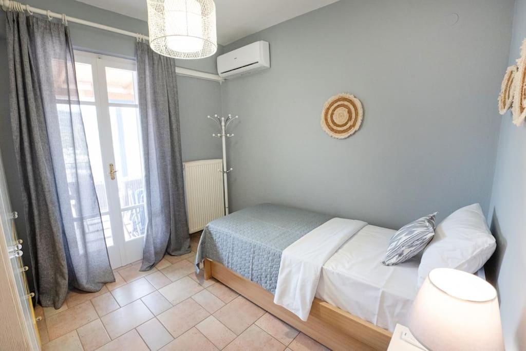 Postel nebo postele na pokoji v ubytování Villa EuphoRia, Poros - Greece