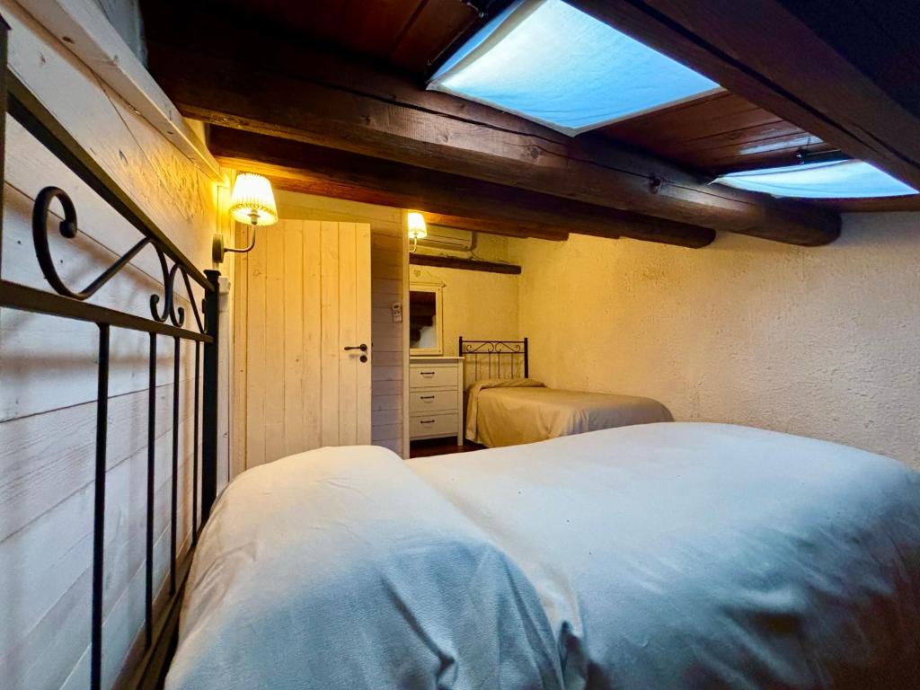 Posteľ alebo postele v izbe v ubytovaní Locanda Angelica