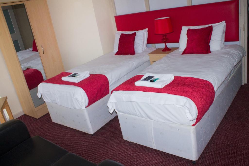 Postel nebo postele na pokoji v ubytování Hotel Express Newcastle Gateshead