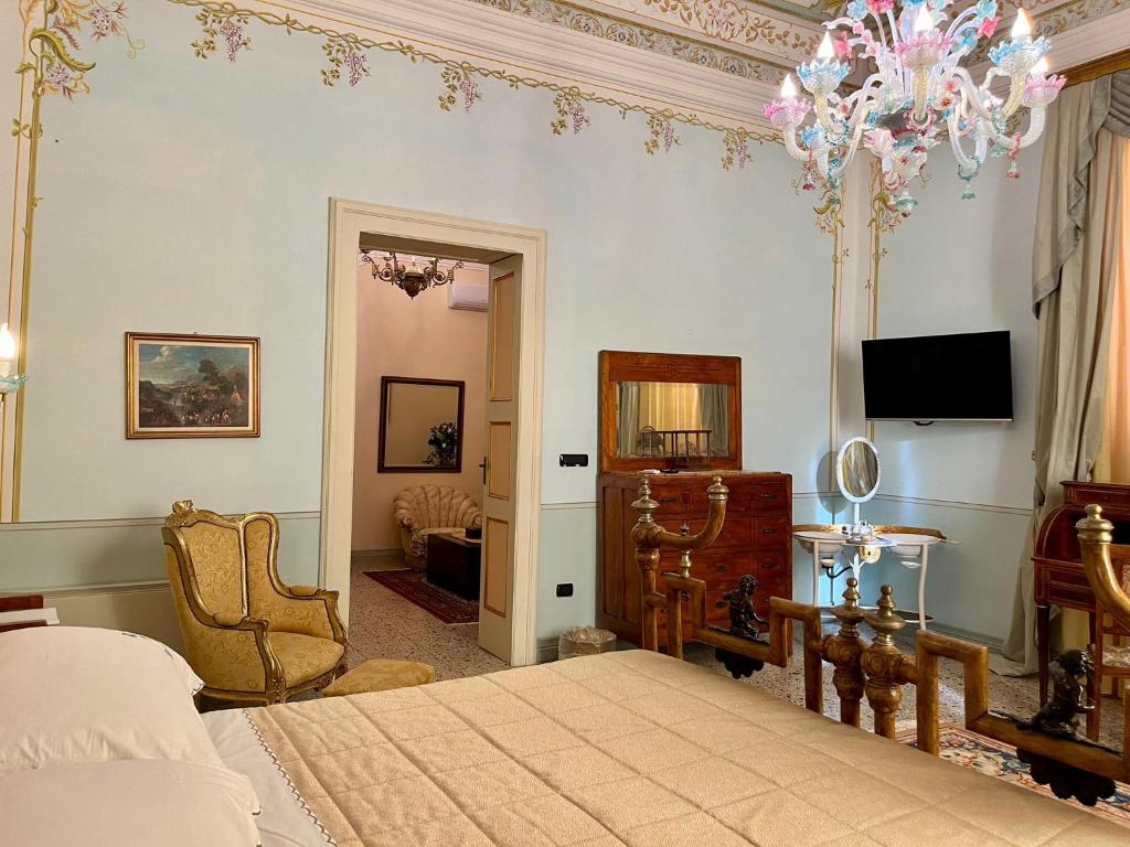 TV a/nebo společenská místnost v ubytování Palazzo De Castro