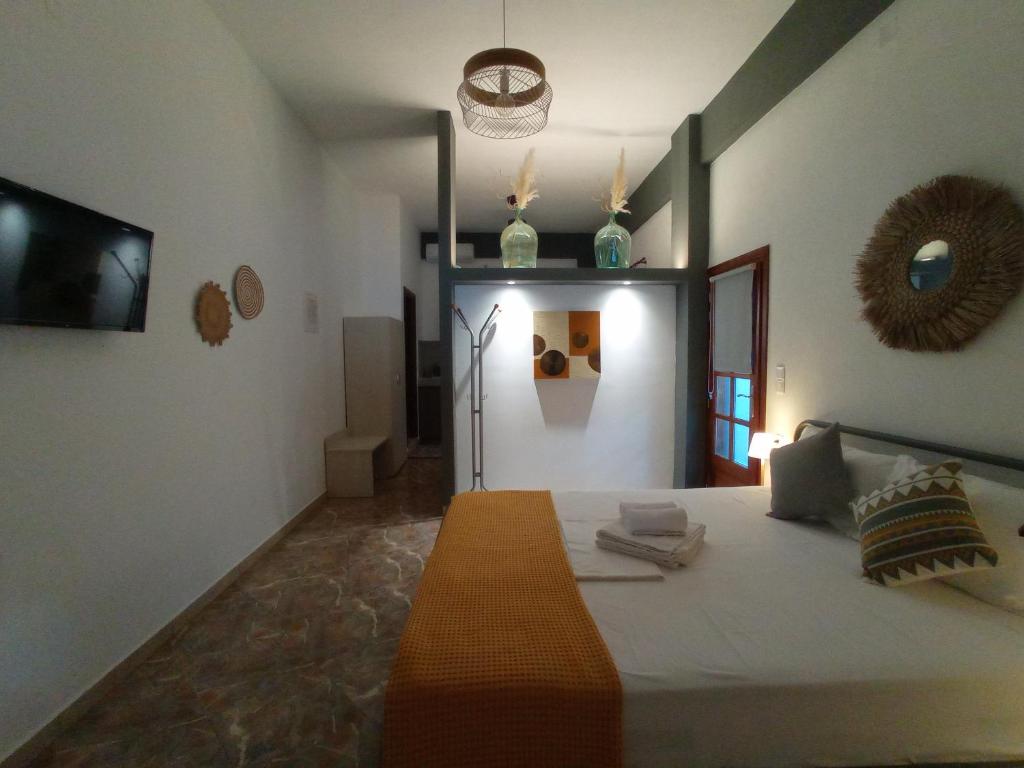 Postel nebo postele na pokoji v ubytování Amfithea Seaview apartment