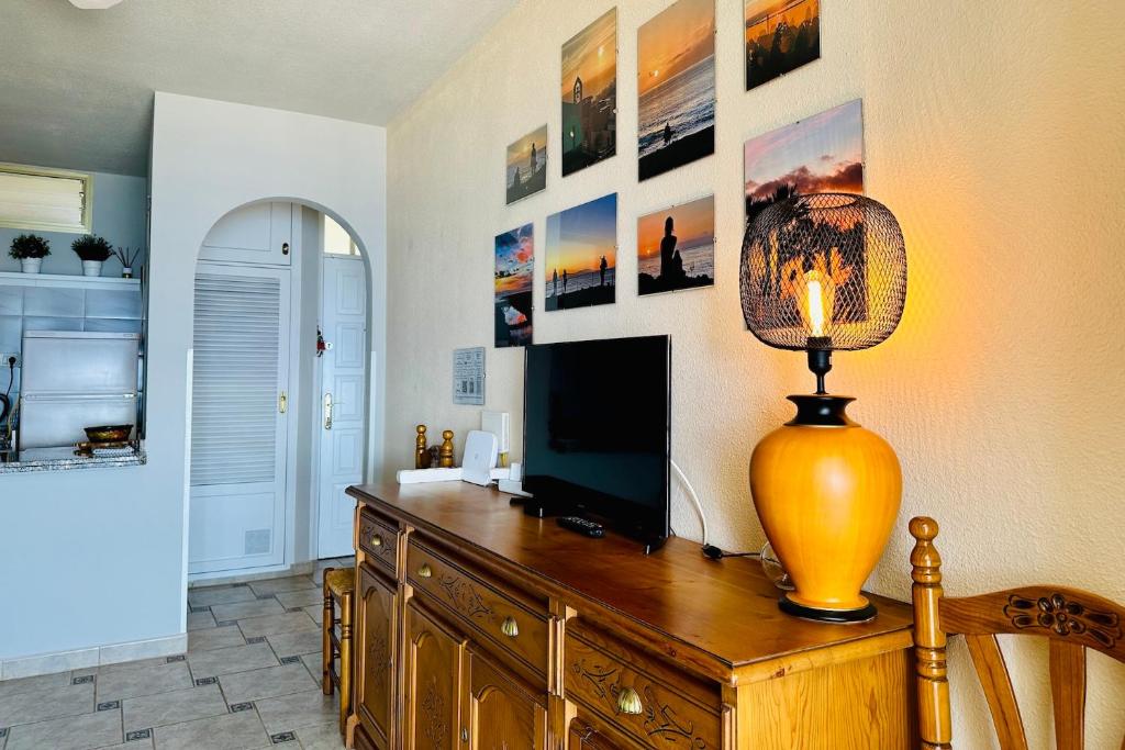 TV a/nebo společenská místnost v ubytování Serigor Bahía Ocean View