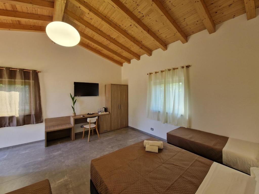 TV a/nebo společenská místnost v ubytování Agriturismo Lumia Resort