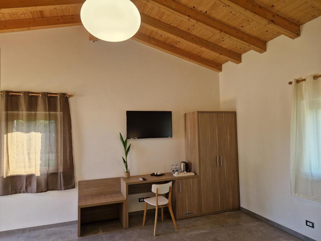 TV a/nebo společenská místnost v ubytování Agriturismo Lumia Resort