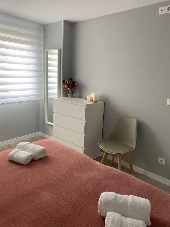 Postel nebo postele na pokoji v ubytování Apartamento da Fraga