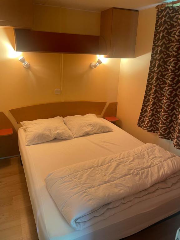 Postel nebo postele na pokoji v ubytování Le Vrai Paradis