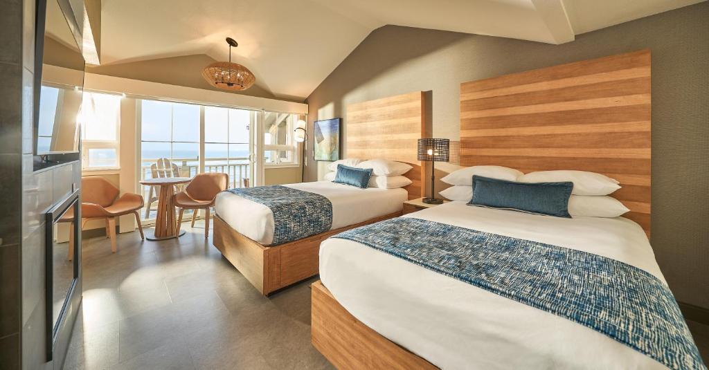 Postel nebo postele na pokoji v ubytování Surfsand Resort
