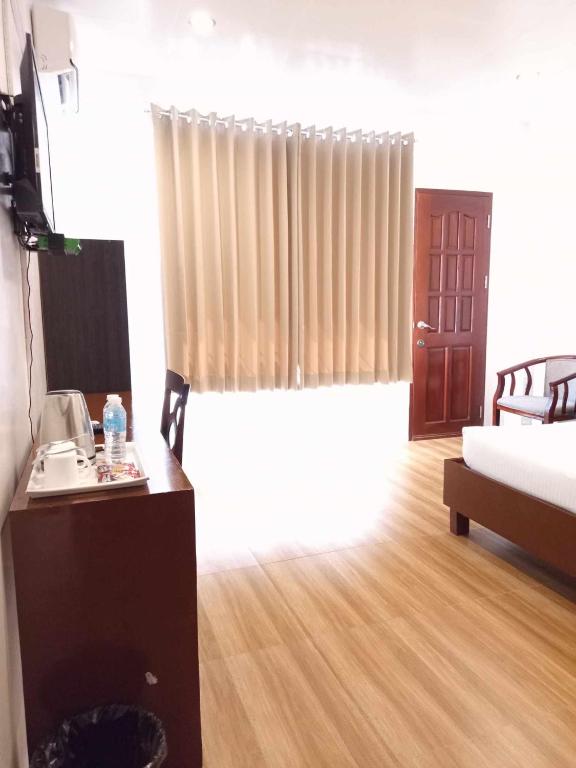 Postel nebo postele na pokoji v ubytování Zosimo's Inn