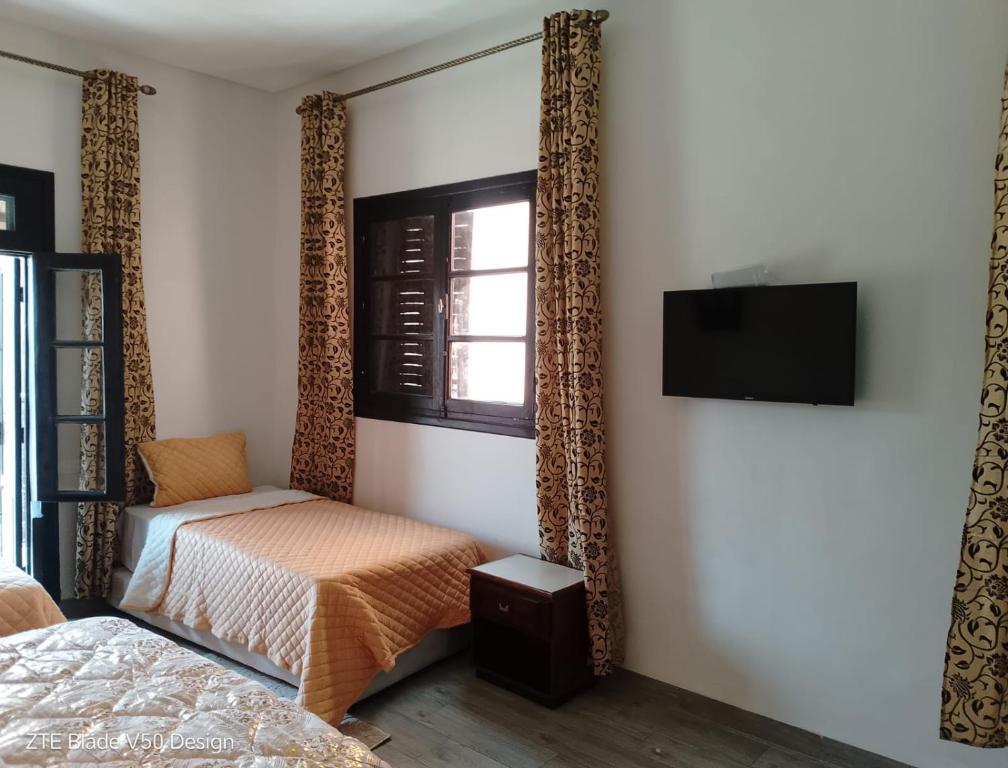 Postel nebo postele na pokoji v ubytování Medina-in auberge
