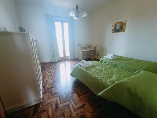 Postel nebo postele na pokoji v ubytování Le Api di PE'