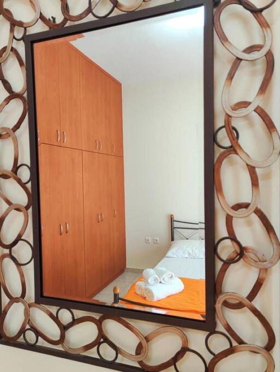 A bed or beds in a room at Bellavista House in Monolithos Rhodes