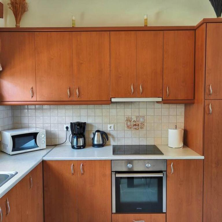 A kitchen or kitchenette at Bellavista House in Monolithos Rhodes