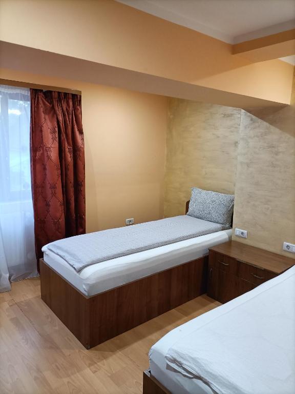 Postel nebo postele na pokoji v ubytování Casa Heidi