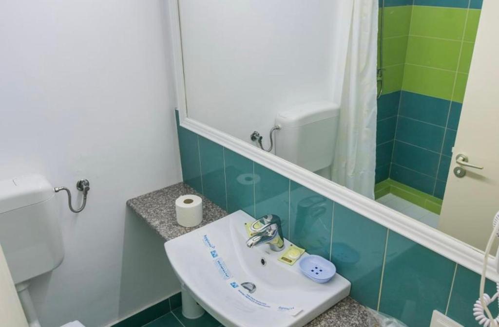 Koupelna v ubytování Hotel Apollo