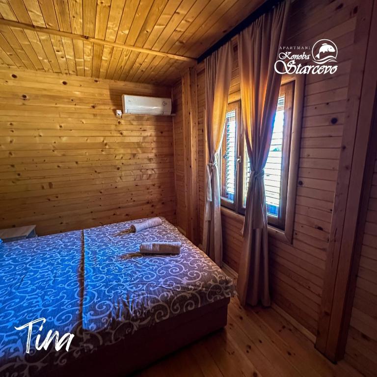 Cama o camas de una habitación en Apartmani Konoba Starčevo