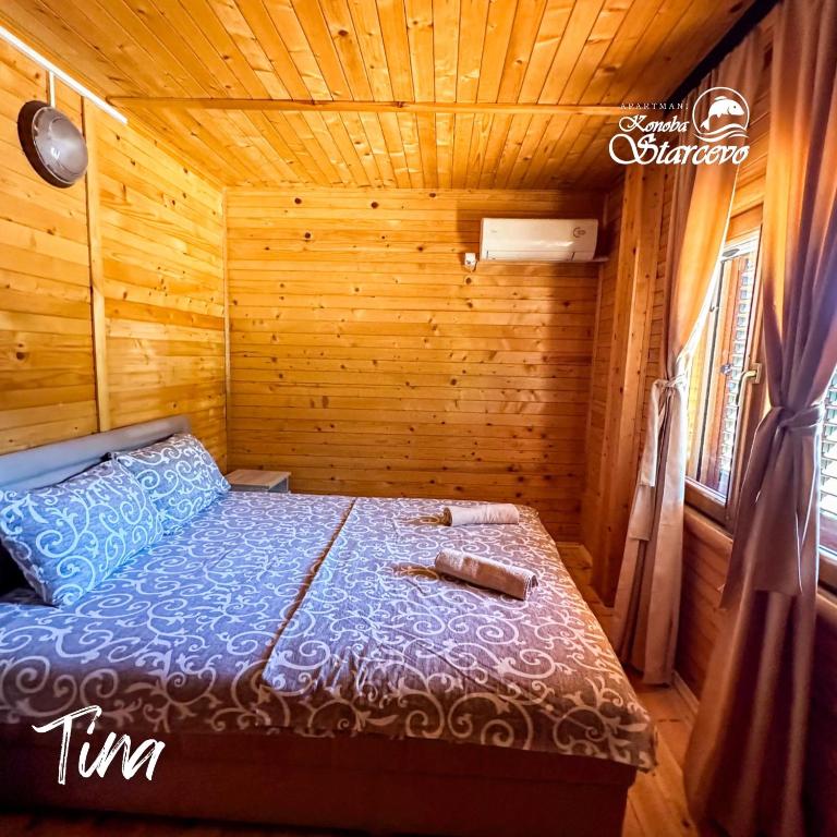 Cama o camas de una habitación en Apartmani Konoba Starčevo