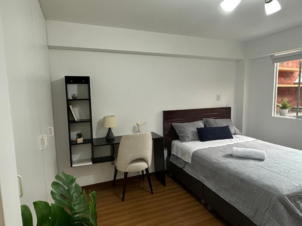 Krevet ili kreveti u jedinici u okviru objekta Habitación privada con baño privado en Miraflores a un paso del malecón con áreas comunes compartidas