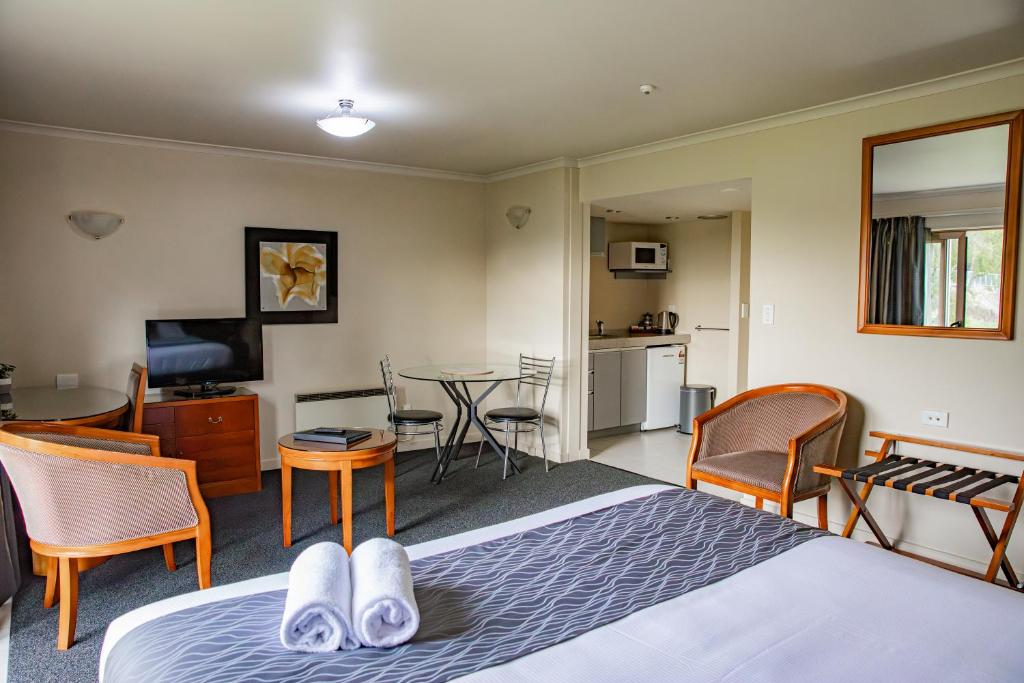 Kuchyň nebo kuchyňský kout v ubytování Admirals Motor Inn