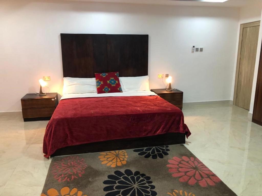 Un pat sau paturi într-o cameră la Fabian Court