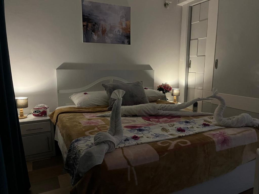Postel nebo postele na pokoji v ubytování PortghalibFlat